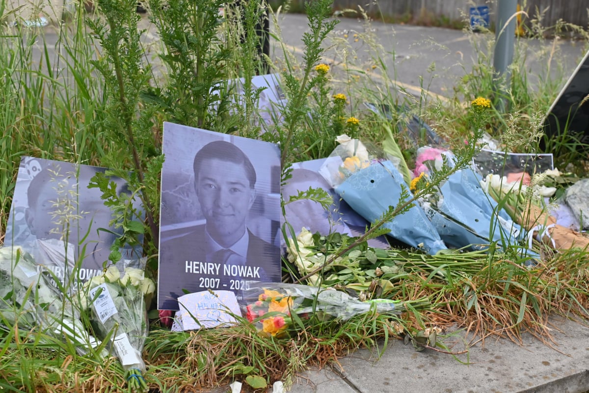 Flowers and a photo of Henry Nowak