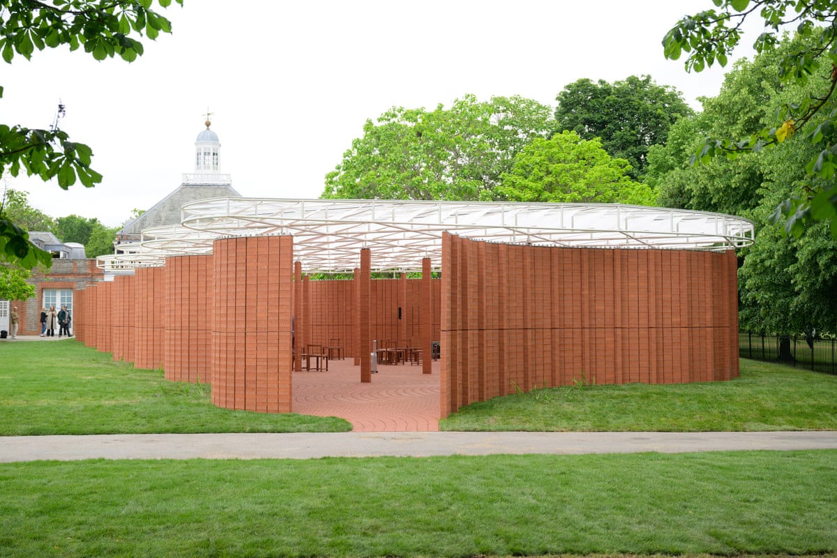 Red rick undulating pavilion with atlas roof