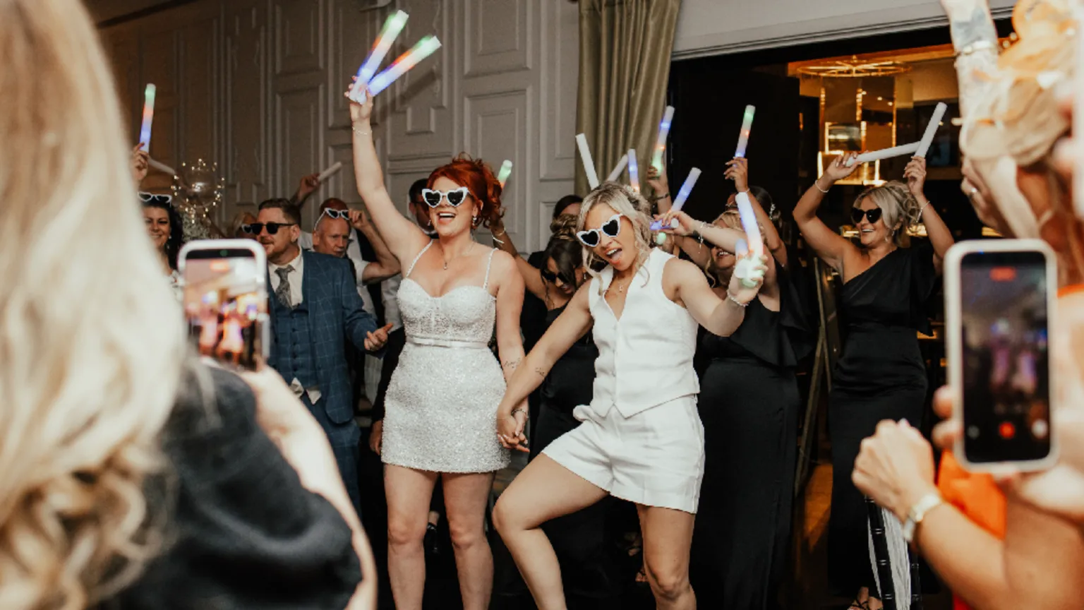 Gavin Joseph Photography and Joanna Knot – Knot Photography Lauren and Carlie at their wedding reception dancing amongst guests