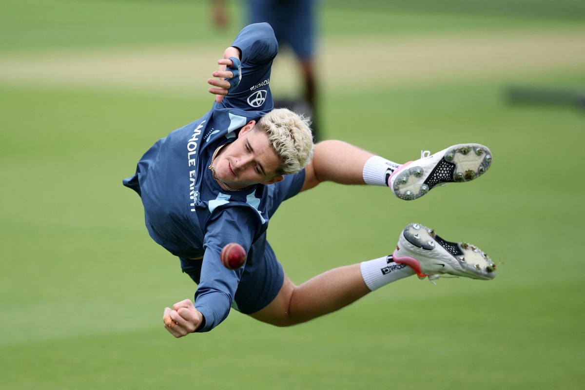 Jacob Bethell dives during an England practice session.