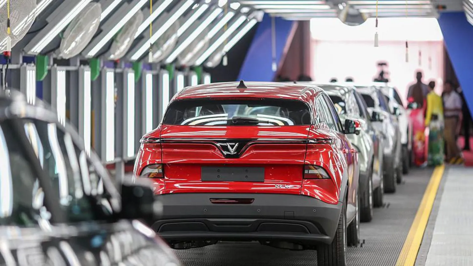 Bloomberg via A row of cars at Vietnamese electric vehicle maker VinFast's new factory in South India. 