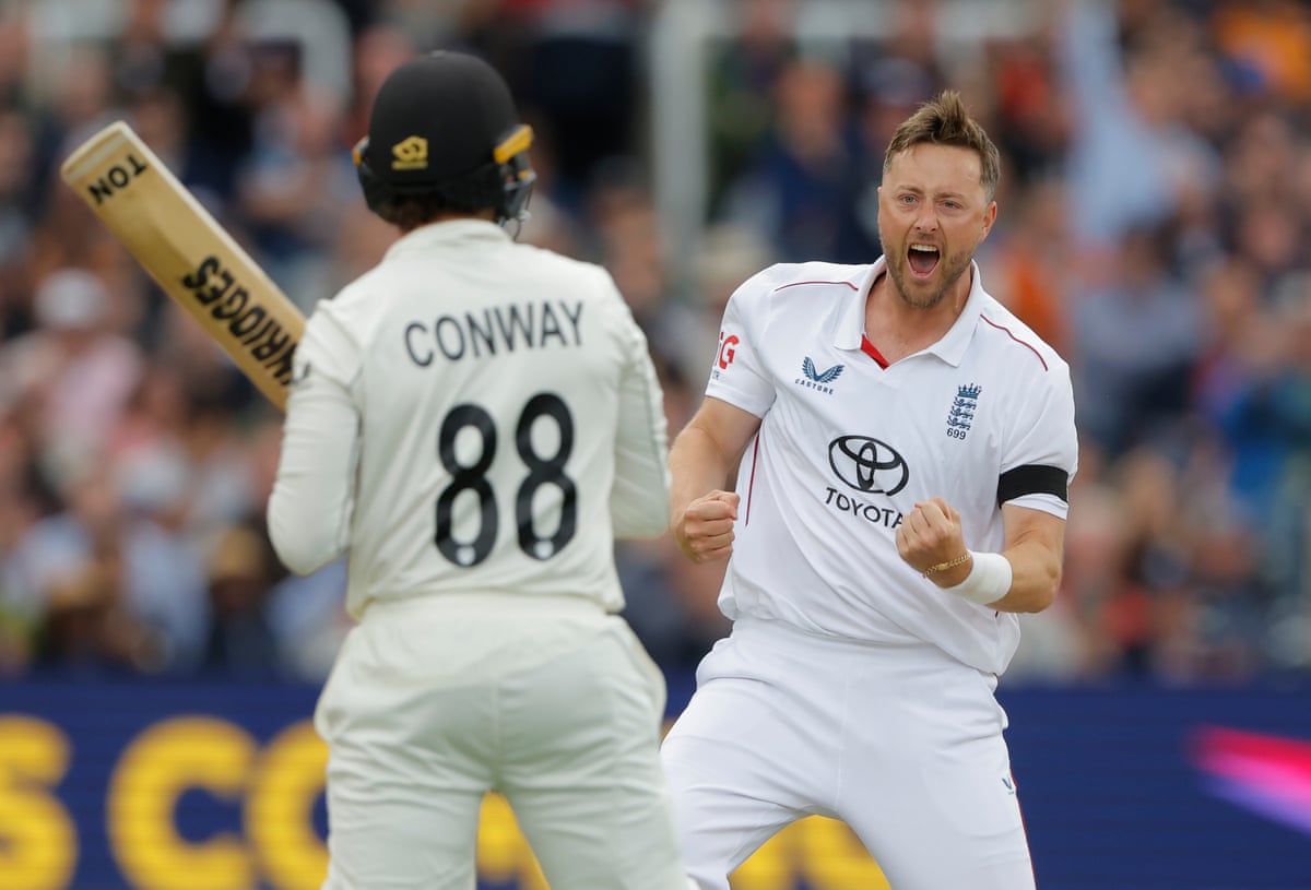 Ollie Robinson of England celebrates getting the wicket of Devon Conway lbw during his opening spell on day one of the 1st test match between England and New Zealand at Lord’s
