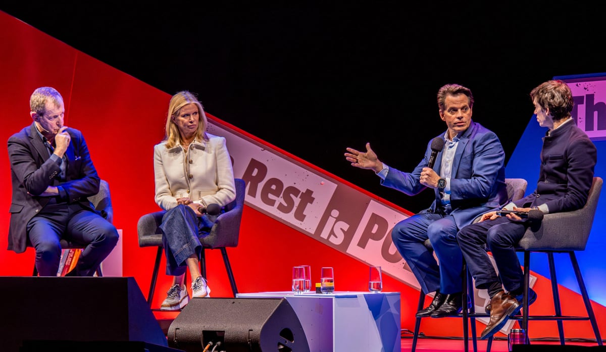 Alastair Campbell, Katty Kay, Anthony Scaramucci and Rory Stewart sit on chairs on a stage