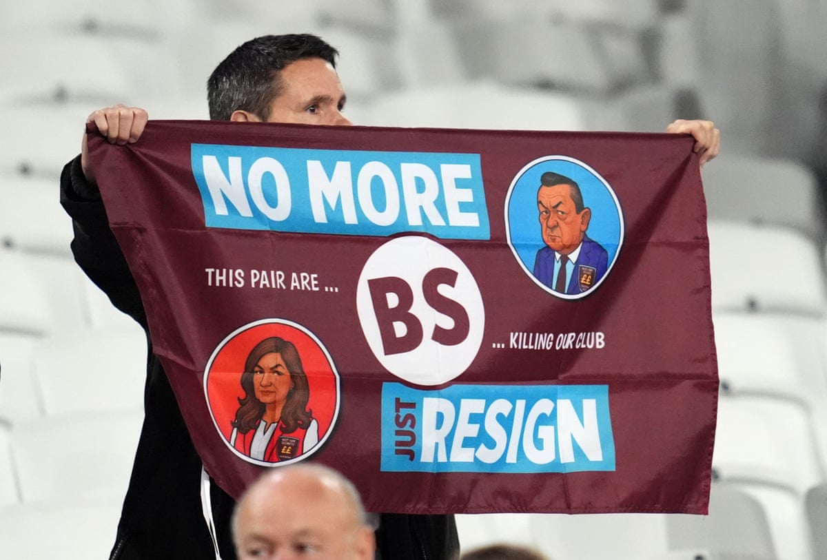 A West Ham fan with a banner.