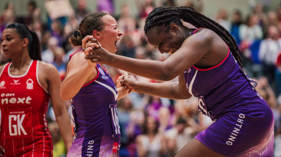 Hannah Joseph celebrates with Loughborough Lightning team-mate Samantha Wallace-Joseph after they beat Nottingham Forest in the 2026 Netball Super League play-offs