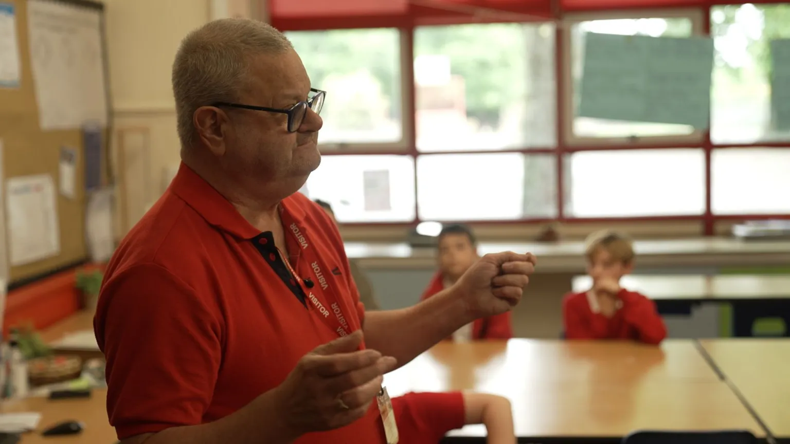 A man talks to the class