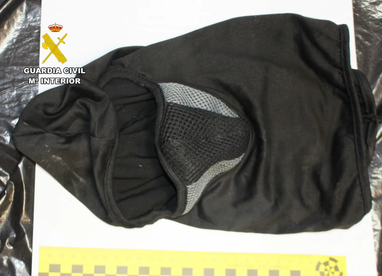 Civil Guard A police photograph of a black balaclava.