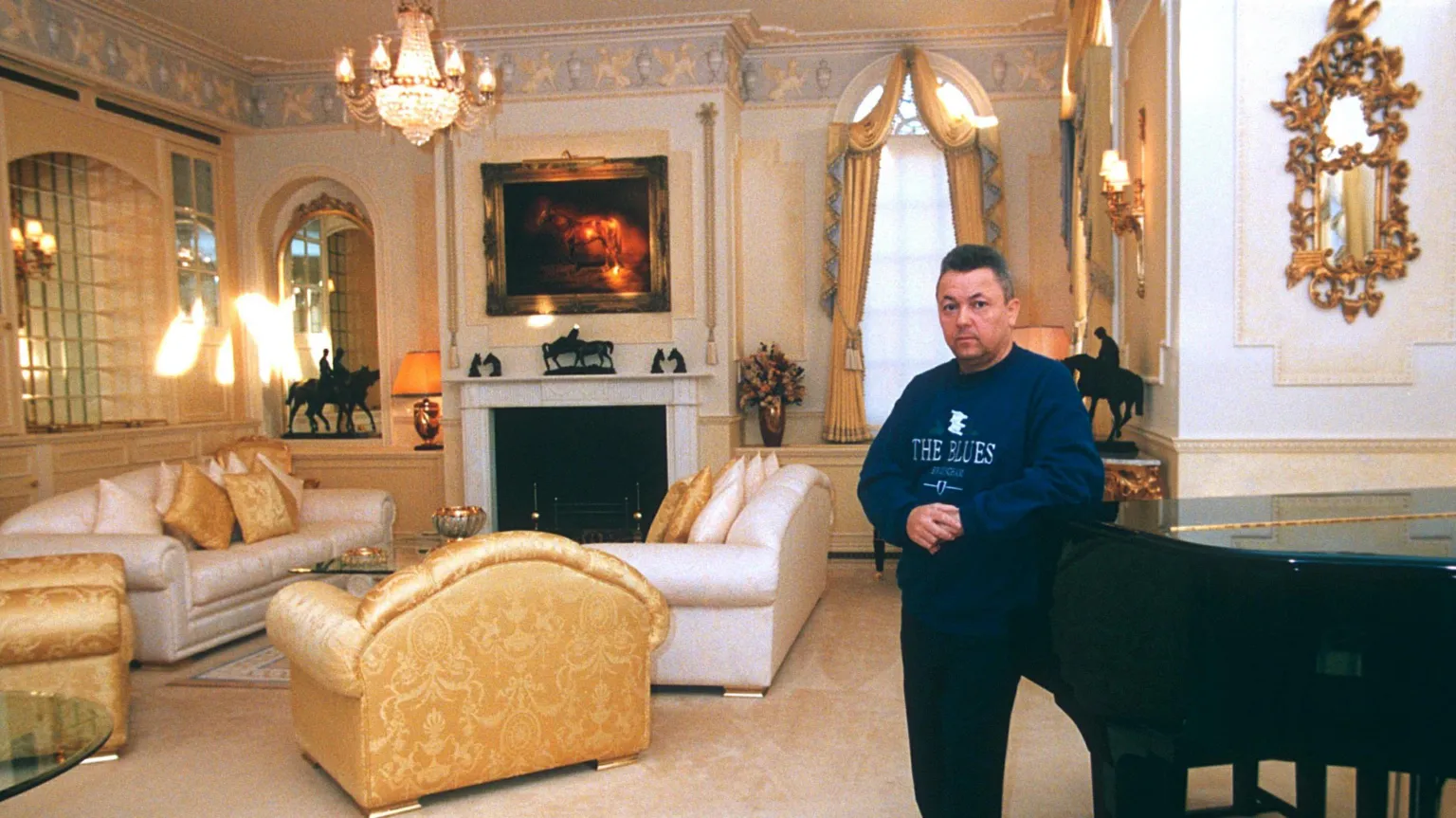 Shutterstock David Sullivan pictured at home in the 1990s, wearing a sweatshirt which says