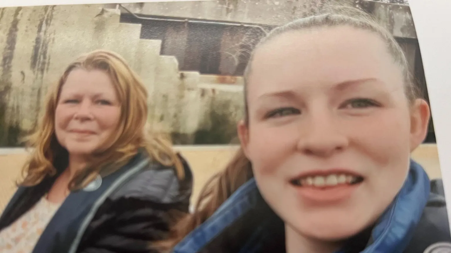 Teresa Hall A selfie shows Teresa and Morgan both smiling and looking at the camera. Morgan is wearing a denim jacket and has a ponytail. Teresa has red shoulder-length hair.