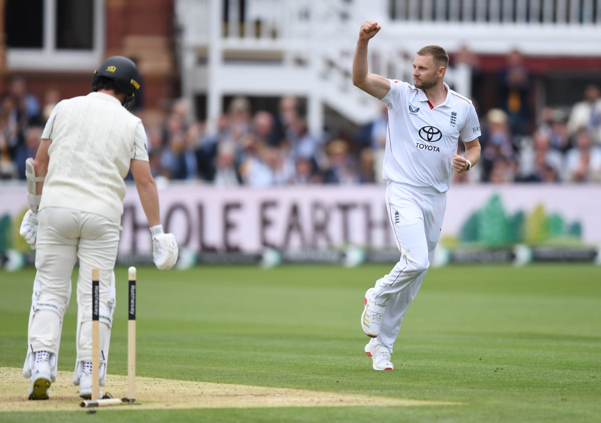 Gus Atkinson of England celebrates after dismissing Matt Henry at Lord's