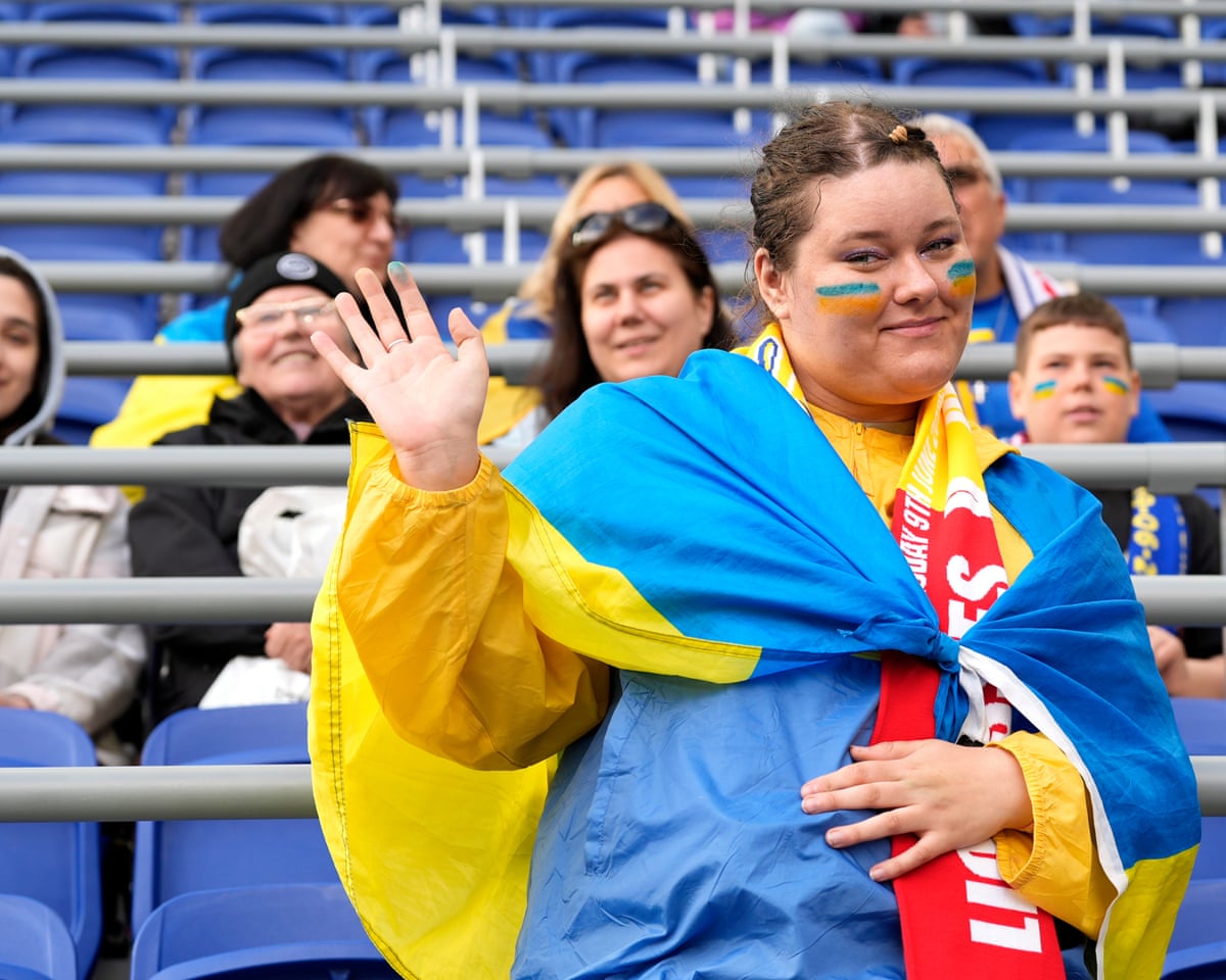 A Ukraine fan in full regalia.