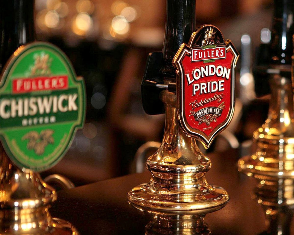 Beer taps inside The Counting House pub in the City of London. Fuller, Smith & Turner