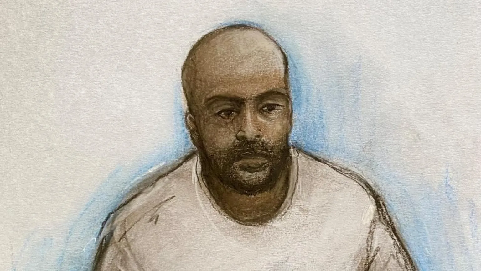 Elizabeth Cook/PA Wire Court artist drawing by Elizabeth Cook of Sudanese national Hadi Alodid, 30 appearing via videolink at Belfast Magistrates Court. He is depicted as having brown skin, no hair with a dark beard. He is drawn as wearing a white top and the background is plain.
