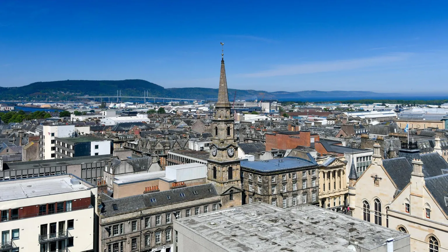 A view across Inverness city centre towards the Longman, Kessock Bridge and the Black Isle on a sunny day