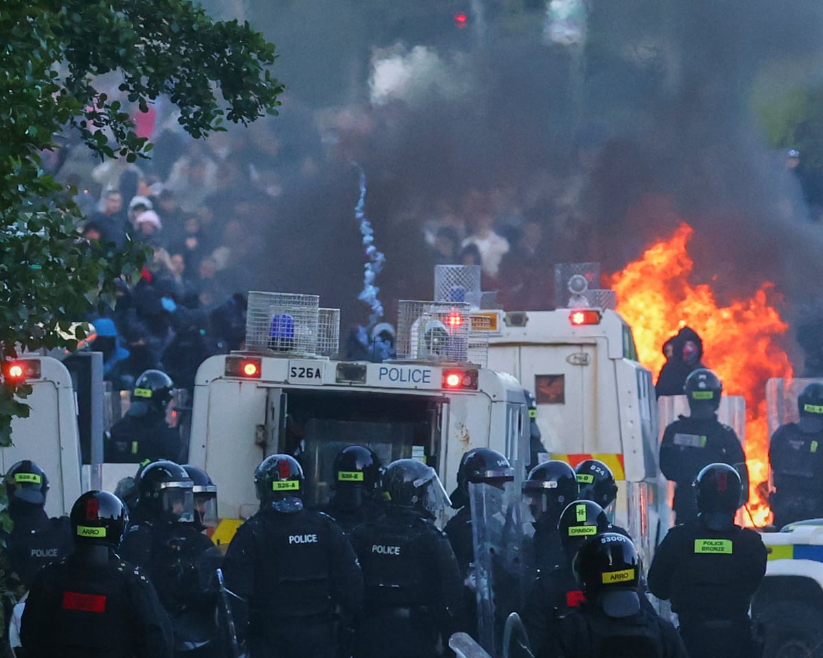 Police attempt to people near Newtownabbey in Belfast, Northern Ireland on Wednesday.