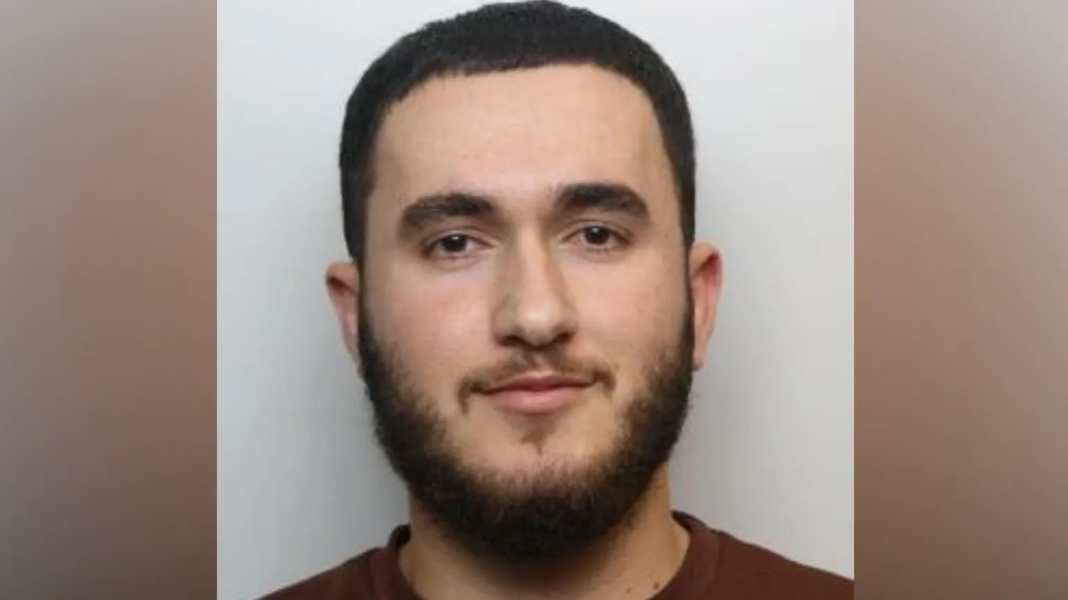 South Yorkshire Police A mugshot of Muhamadi.