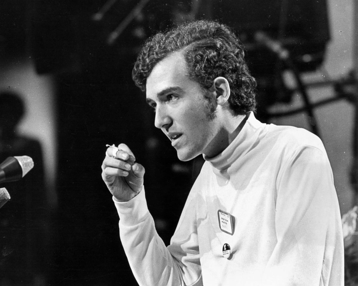 A black and white profile photograph of Peter Hain in 1969. He is wearing a white turtleneck