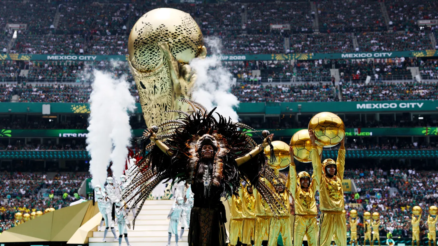 Performers during the opening ceremony before the match