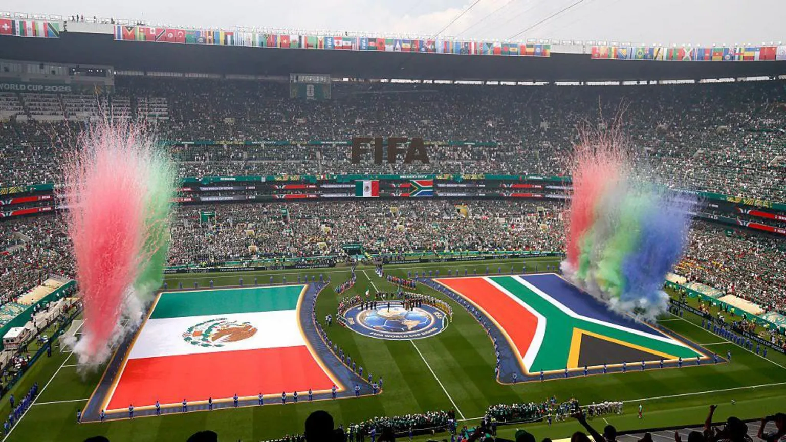 AFP via This view shows the Mexican and South African flags during the opening ceremony ahead of the 2026 World Cup Group A football match between Mexico and South Africa at the Mexico City Stadium in Mexico City
