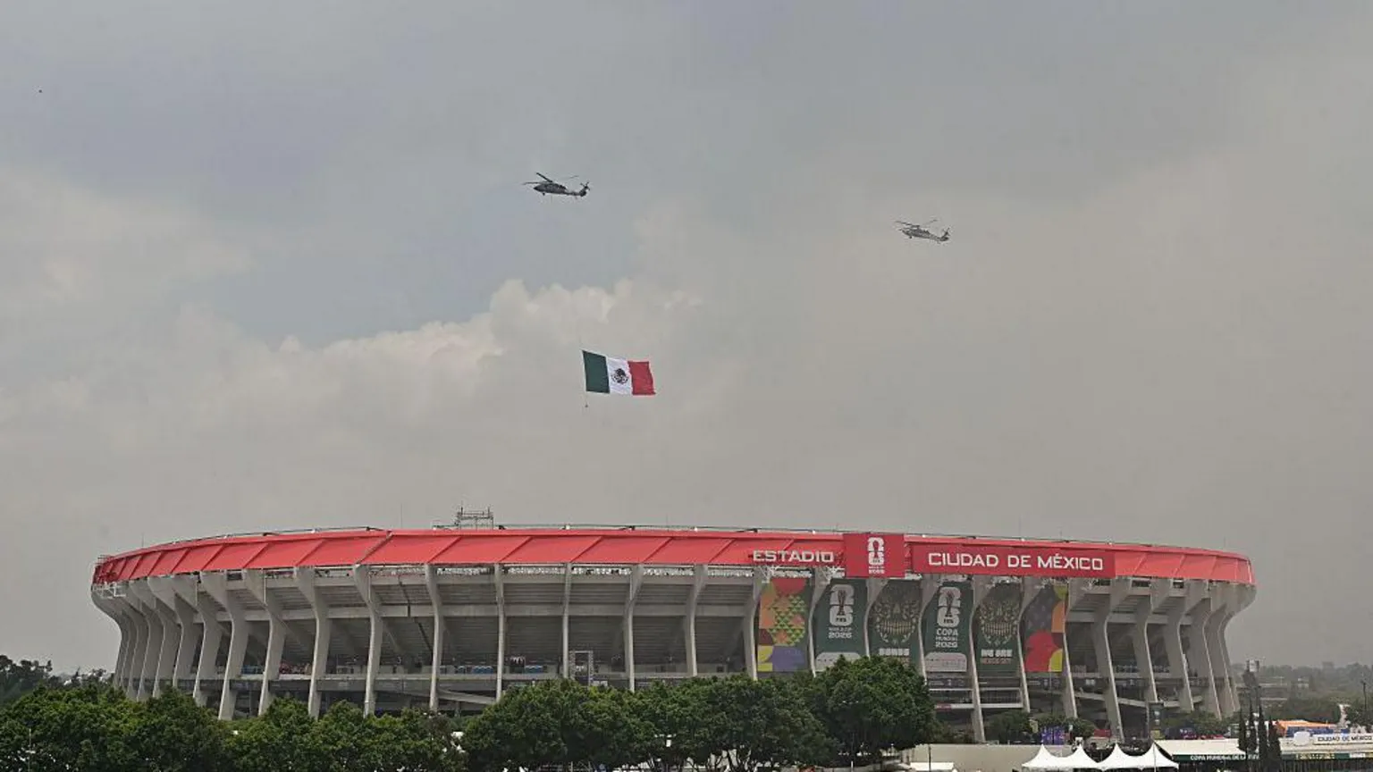AFP via Mexican Air Force helicopters with a Mexican flag fly over the opening ceremony ahead of the 2026 World Cup Group A football match between Mexico and South Africa