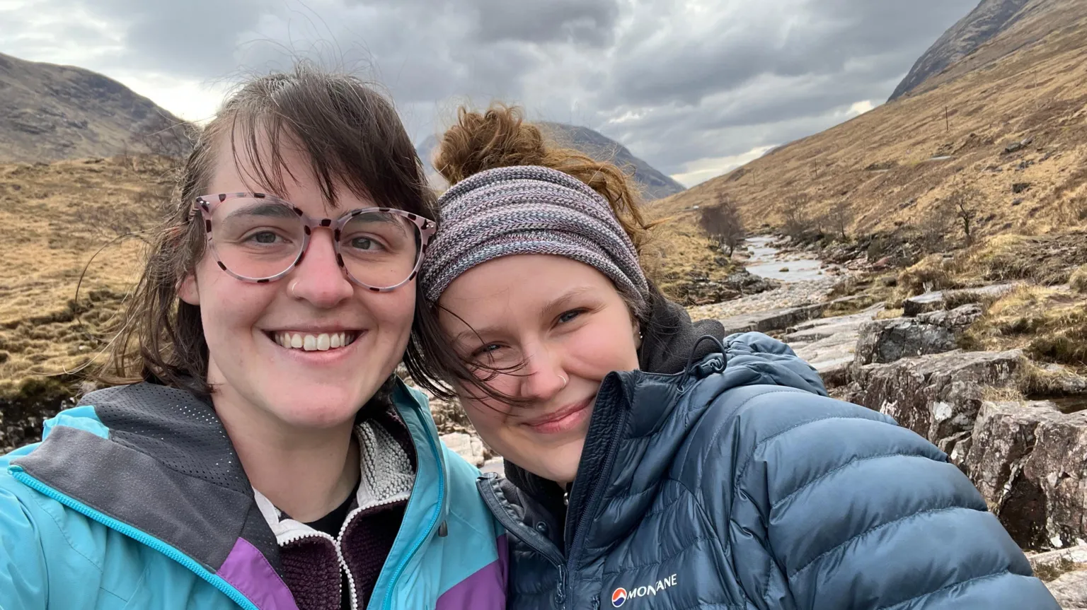 Chloe Two women taking a selfie with mountains behind them 