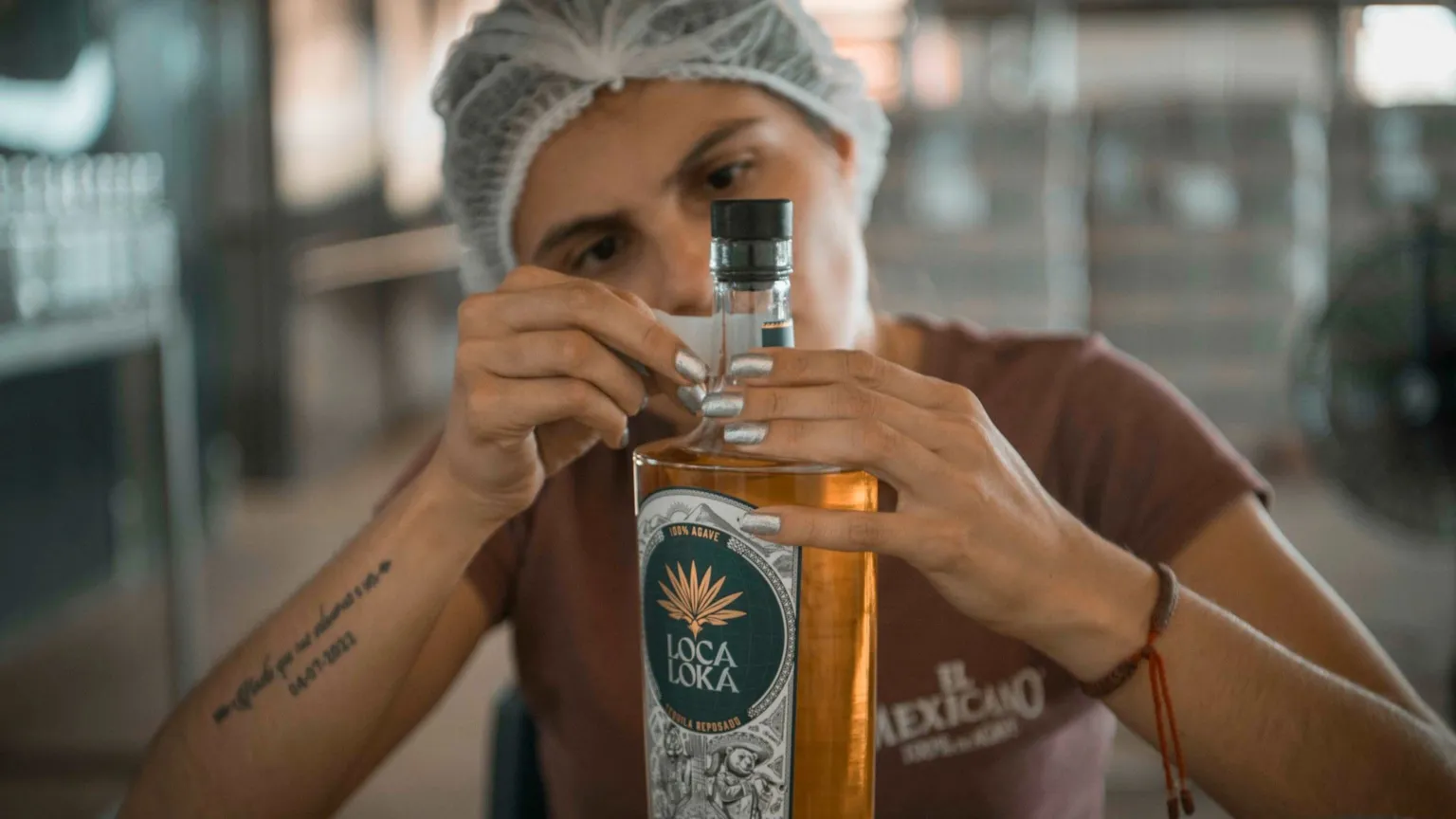 Loca Loka A worker puts a label on a bottle of Loca Loka tequila