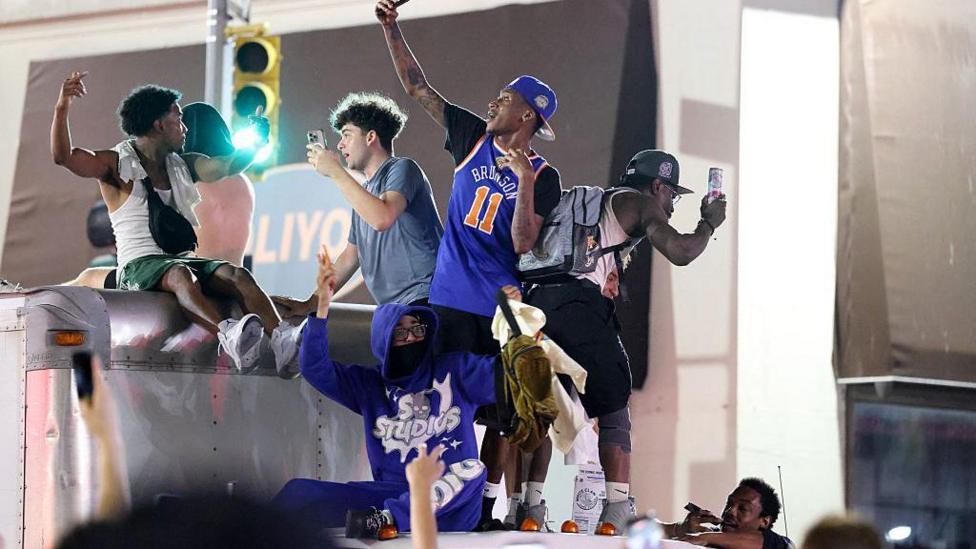 New York Knicks fans celebrate their side's big win