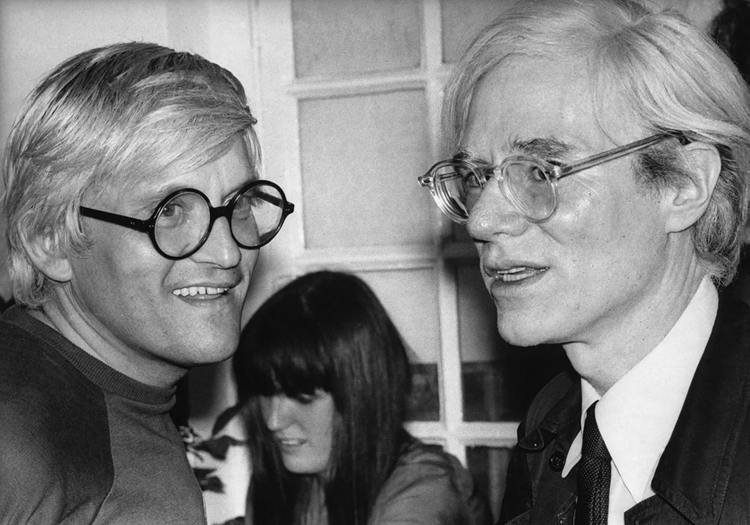 British and American artists David Hockney (l) and Andy Warhol
