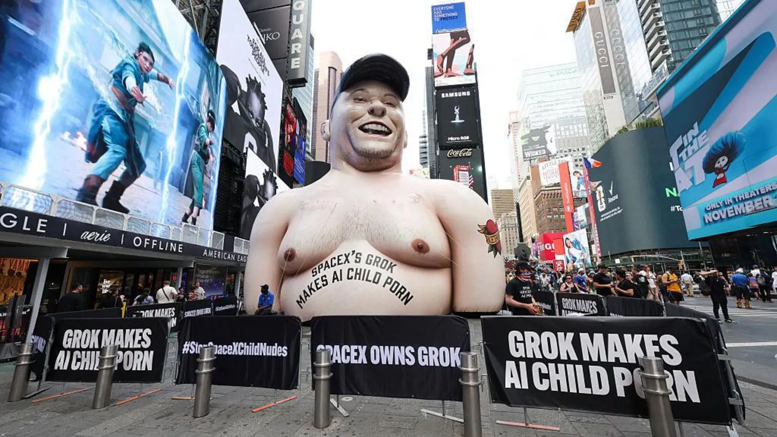 An inflatable balloon in New York City's Times Square designed to resemble Elon Musk has the words