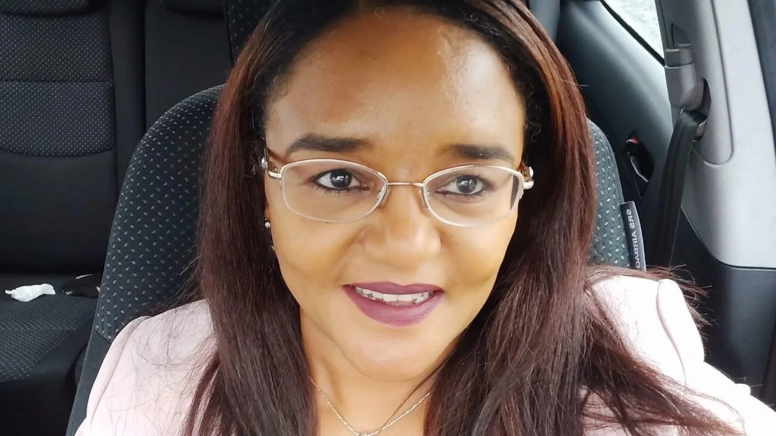 Twasul Mohammed Twasul Mohammed. She has long brown hair, and is wearing glasses and a pink blazer.