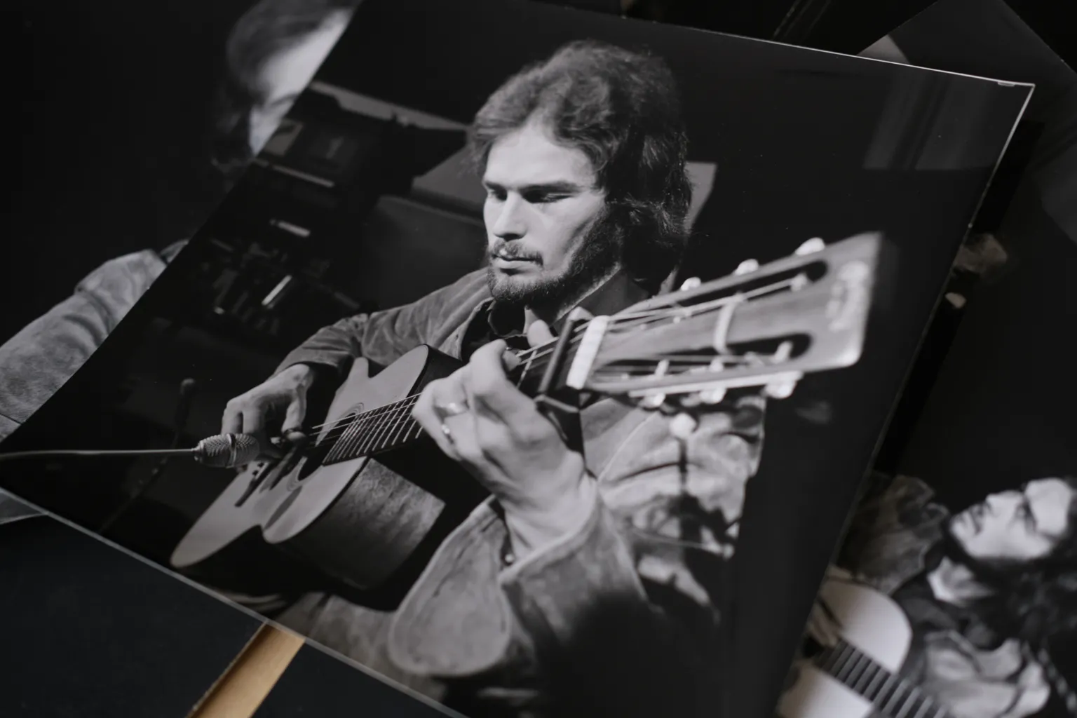 Yorkshire Television/BBC Black & white photo of Allan Taylor playing guitar in the 1970s