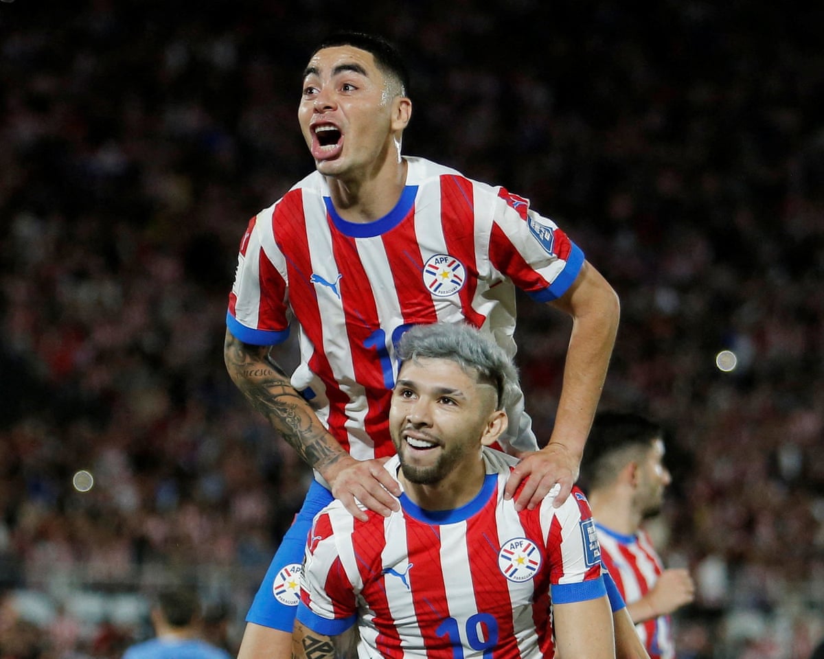 2026 FIFA World Cup PreviewsFILE PHOTO: Soccer Football - World Cup - South American Qualifiers - Paraguay v Uruguay - Estadio Defensores del Chaco, Asuncion, Paraguay - June 5, 2025 Paraguay's Julio Enciso celebrates scoring their second goal with Miguel Almiron /Cesar Olmedo/File Photo