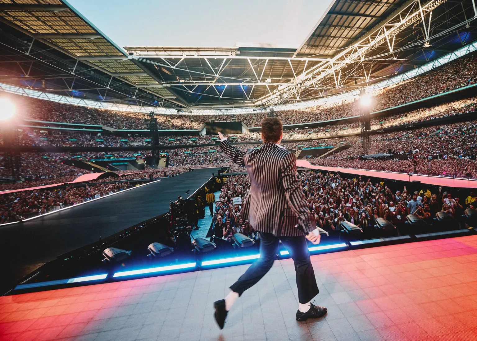 Anthony Pham Harry Styles on stage at Wembley Stadium