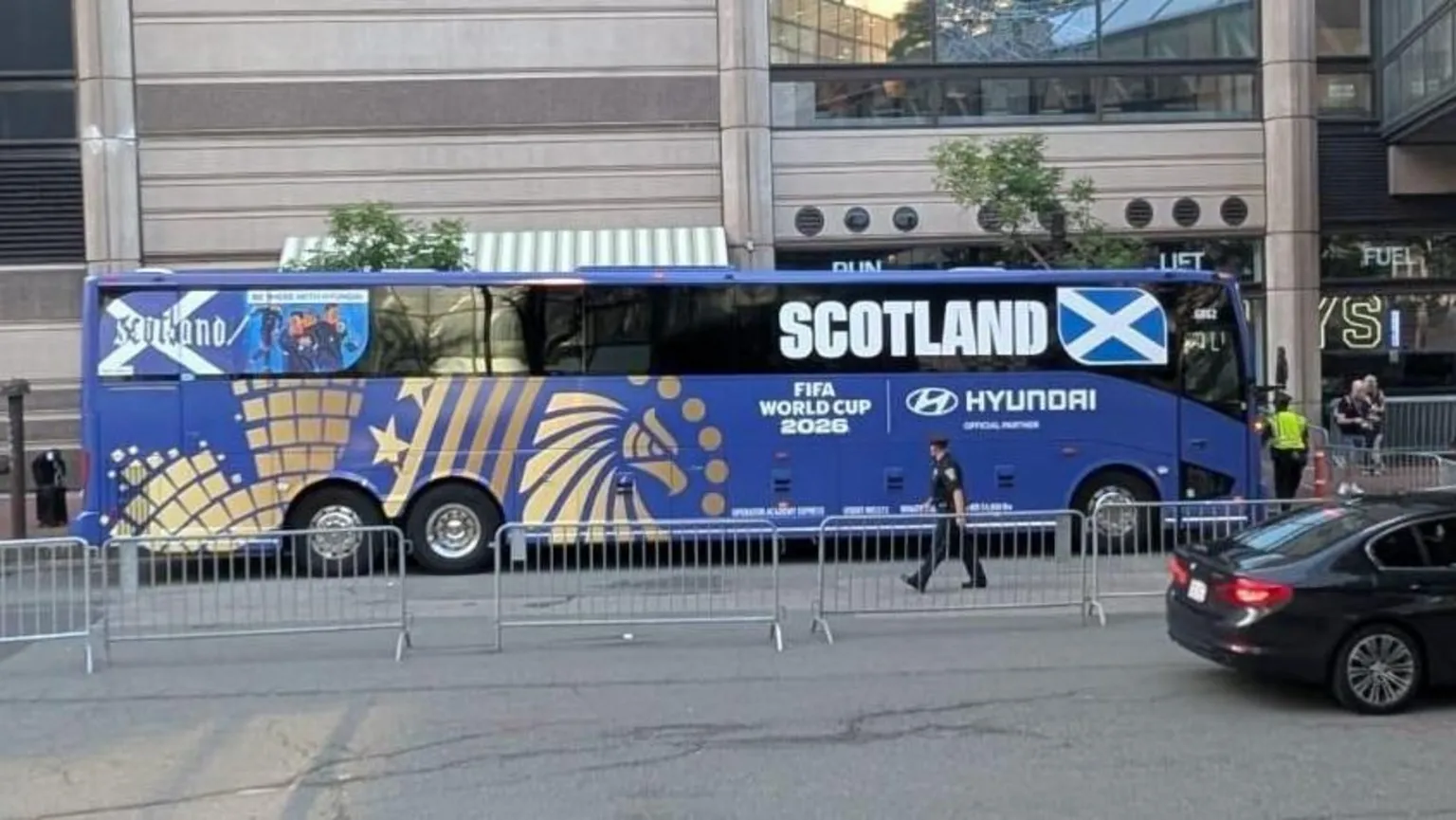 Supplied The Scotland team bus, blue with the word Scotland on the side. A small design saying Scotland with a Saltire and illustration is at the rear of the bus