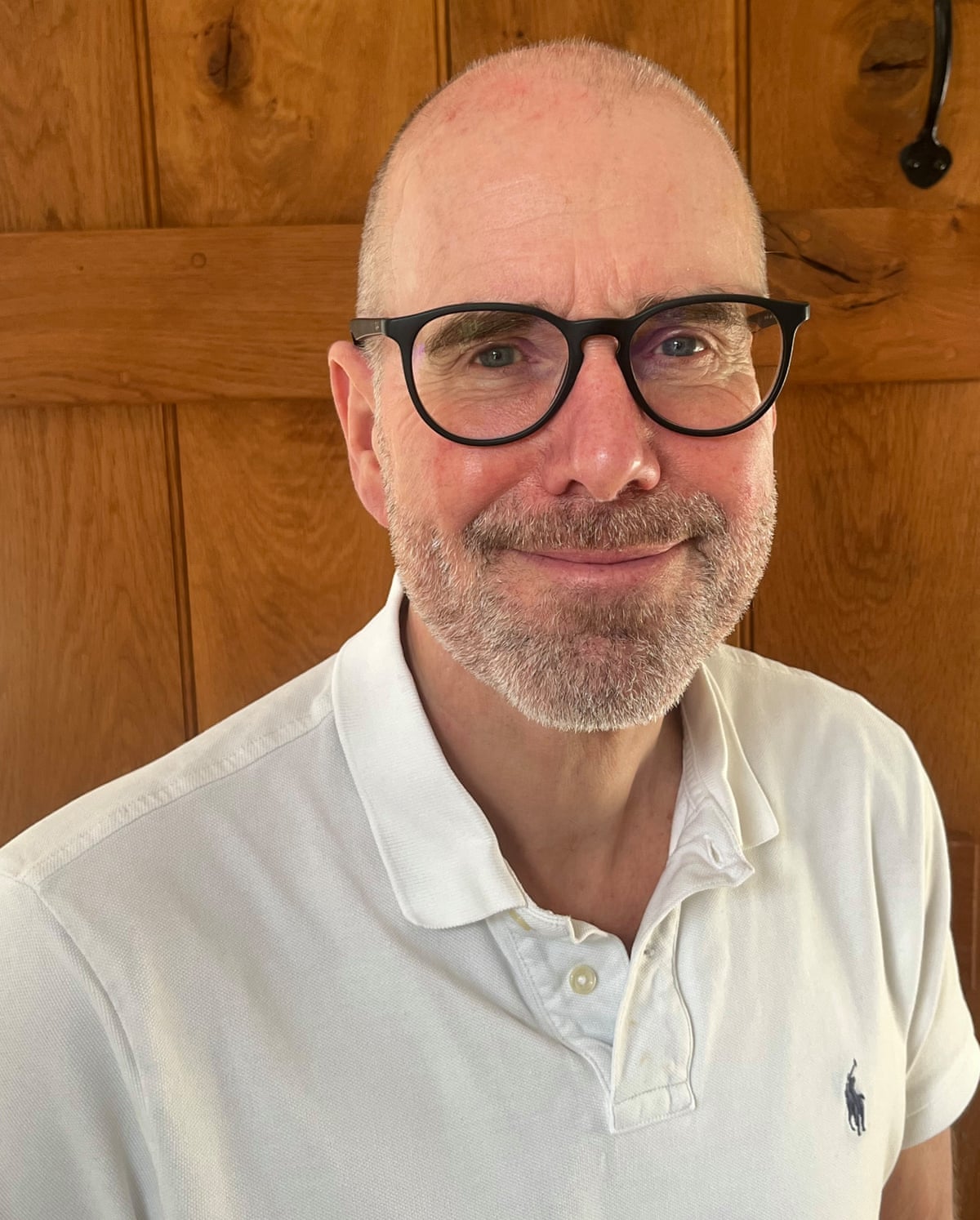Ian Wardle in front of a door 