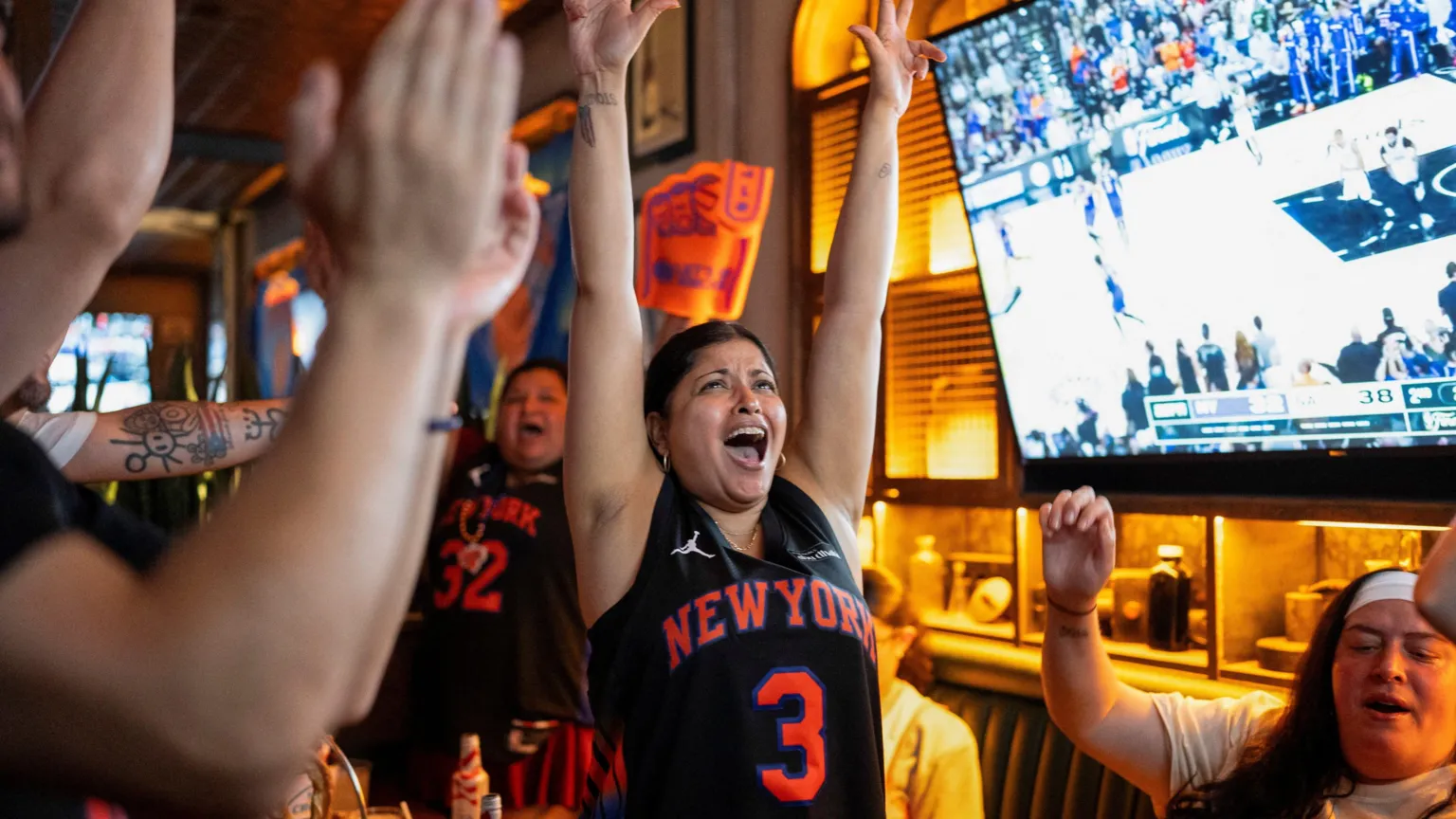 /Christian Monterrosa Fans gather at a watch party at Stout NYC sports bar near Madison Square Garden on the day of Game 5 of the NBA Finals between the New York Knicks and San Antonio Spurs, in New York City, U.S., June 13, 2026. 