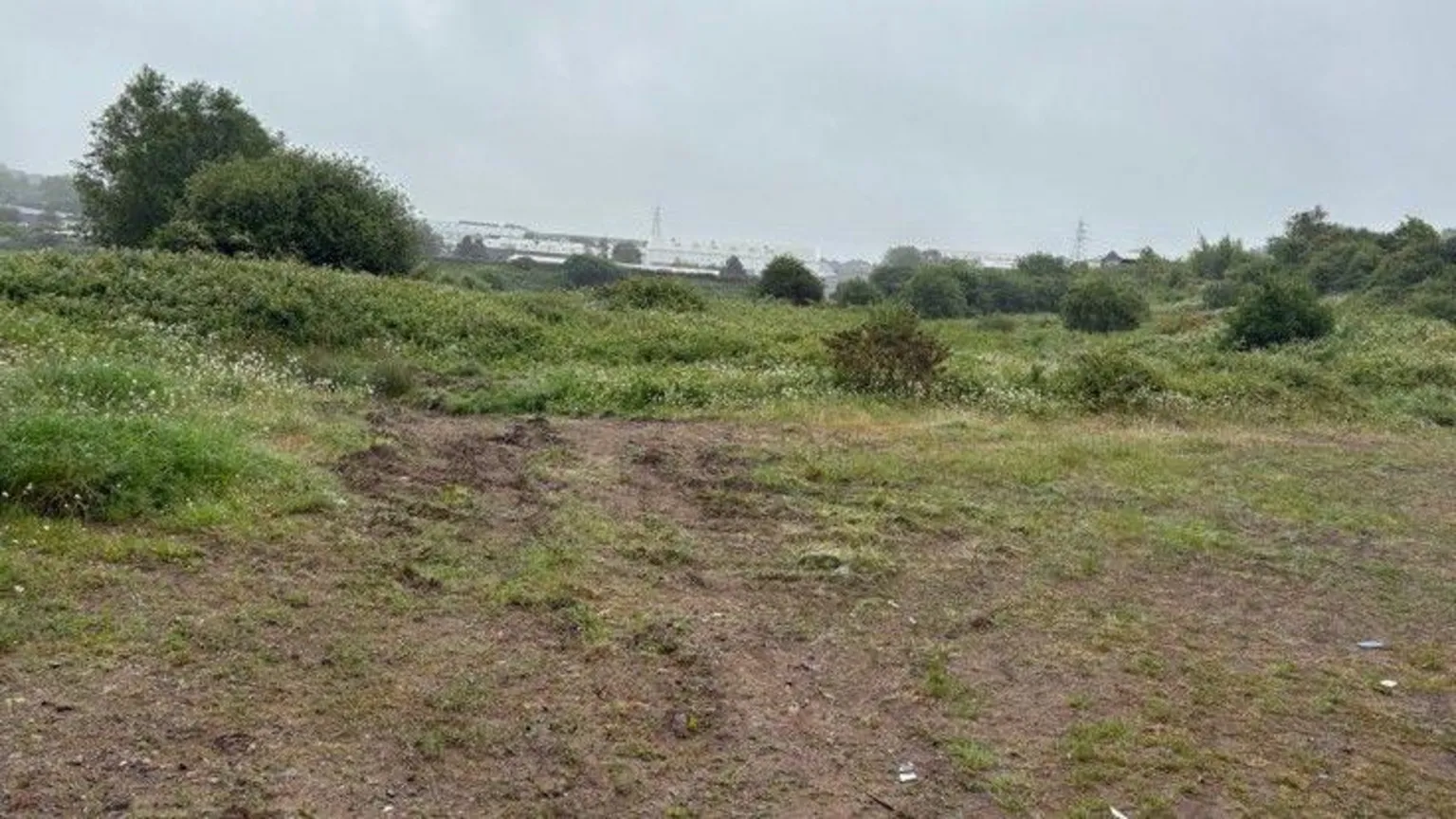 Bridgend council This image is of the undeveloped field, showing an open, slightly uneven landscape