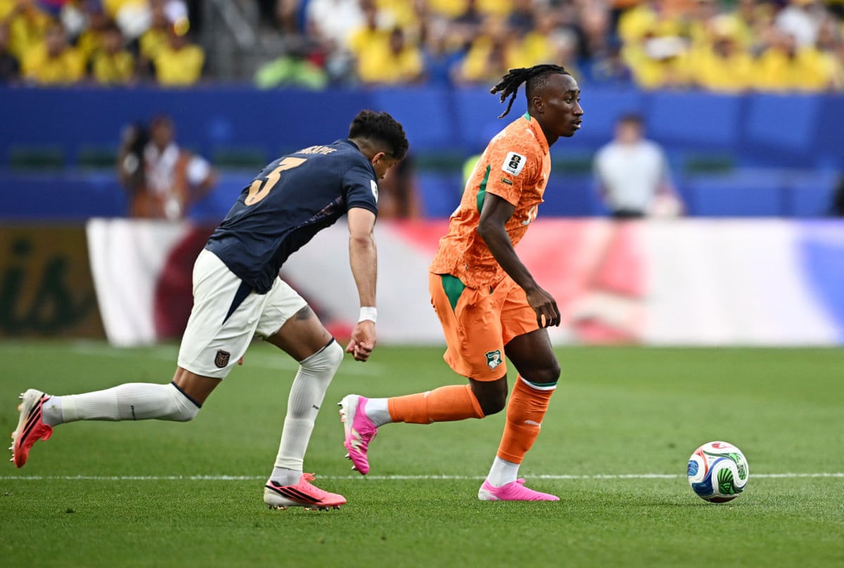 Yan Diomande shimmies past Piero Hincapie on the right for Côte d’Ivoire.