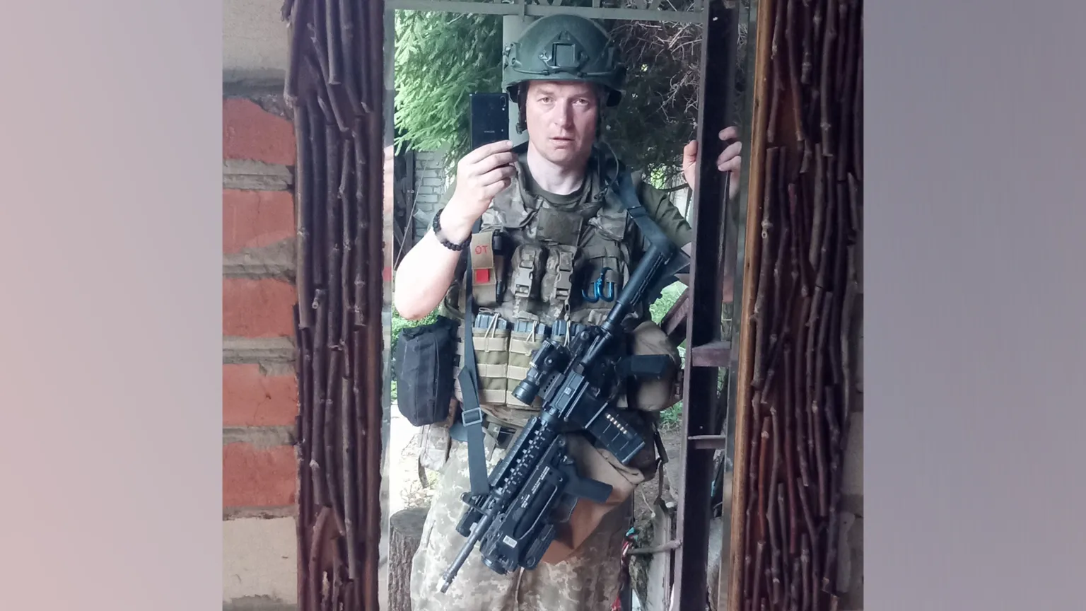 Sergiy Sylantyev Sergiy Sylantyev, a man in Ukraine's military uniform, with a machine gun, taking a selfie.