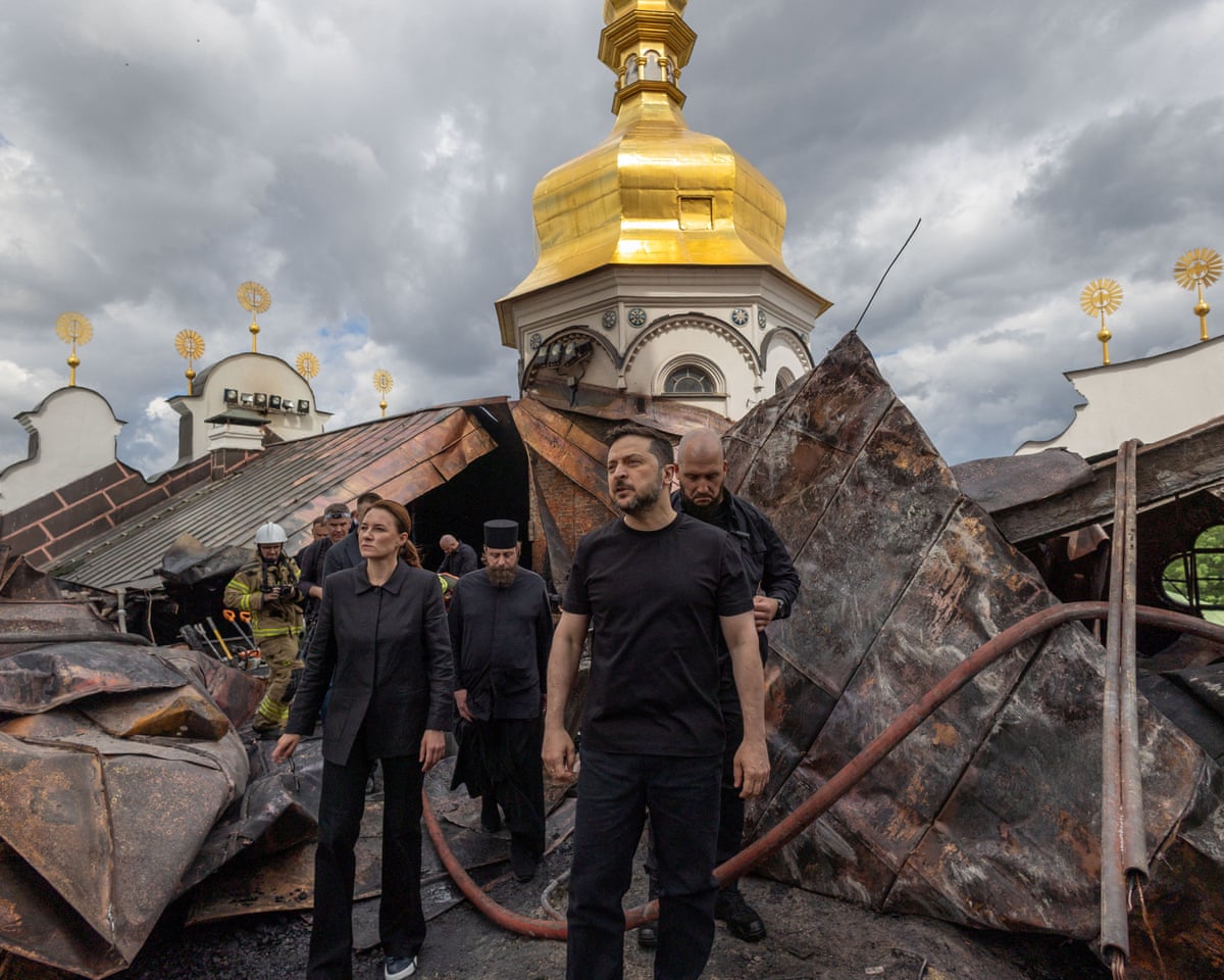 Ukraine's president Volodymyr Zelenskyy and Ukrainian prime minister Yulia Svyrydenko visit the Dormition Cathedral of the Kyiv Pechersk Lavra, which was hit during Russian missile and drone strikes, amid Russia's attack on Ukraine.