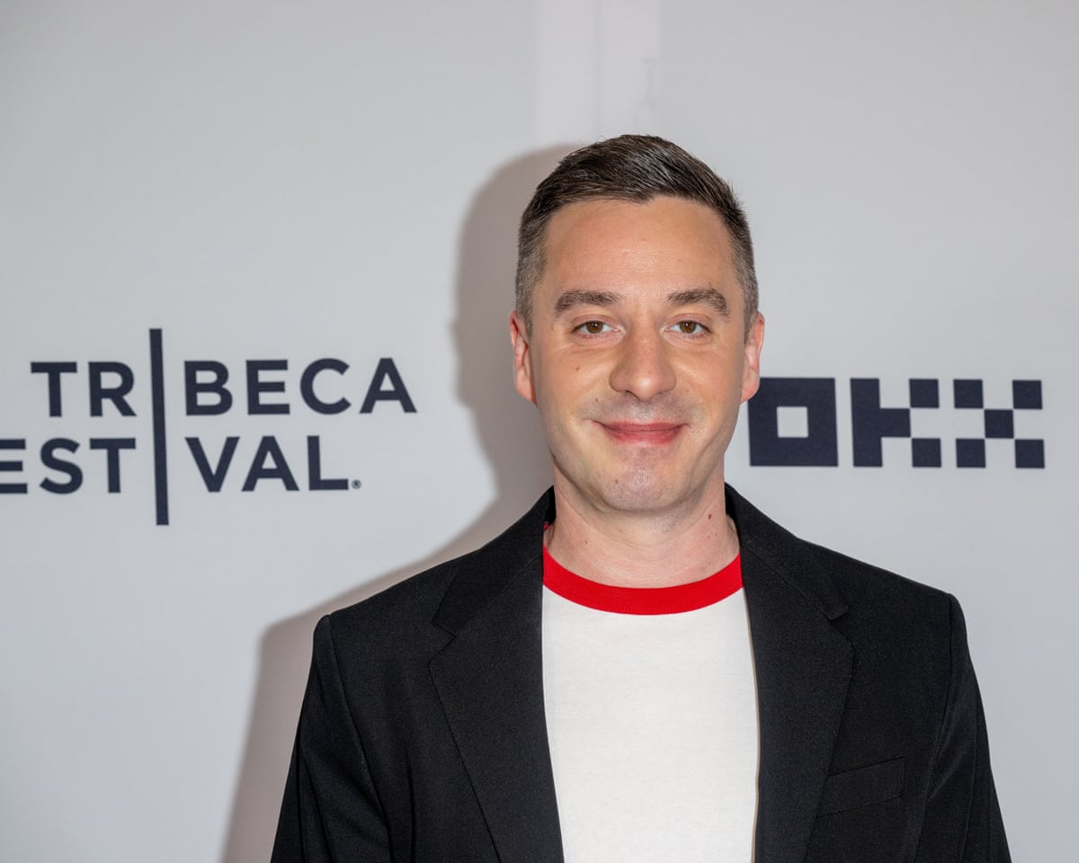 James Graham stands in front of a Tribeca festival sign
