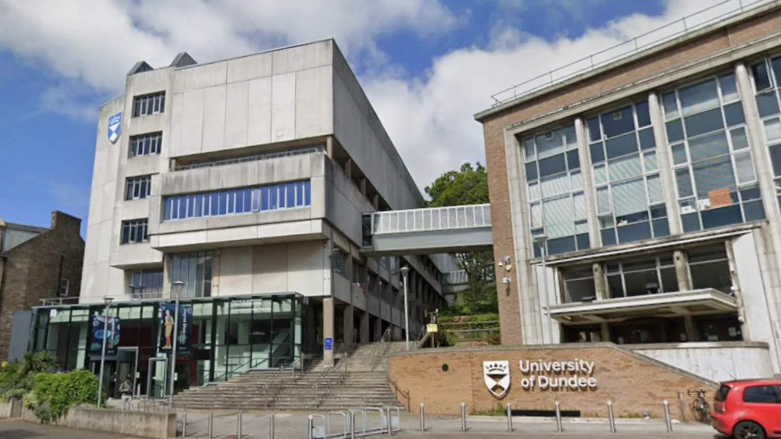 Google Duncan of Jordanstone College of Art and Design, the University of Dundee's Art School. It is a modern grey building and an exterior sandstone wall has the University of Dundee sign