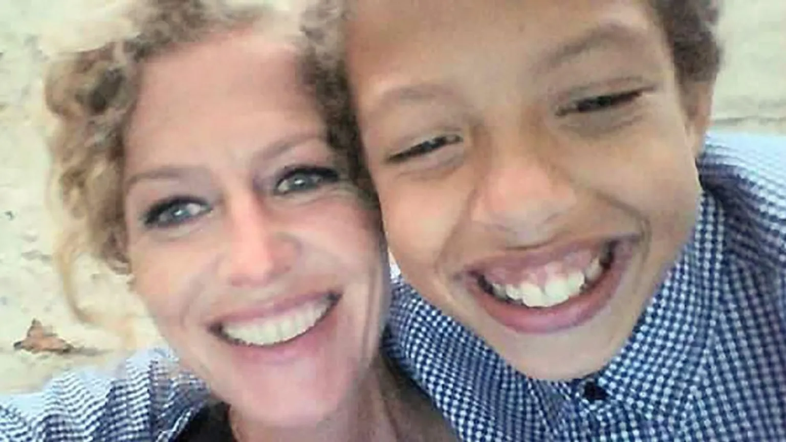 Pacemaker Fiona Donohoe, a woman with blonde curly hair, beside Noah Donohoe, a boy with dark hair, wearing a blue and white checked shirt.