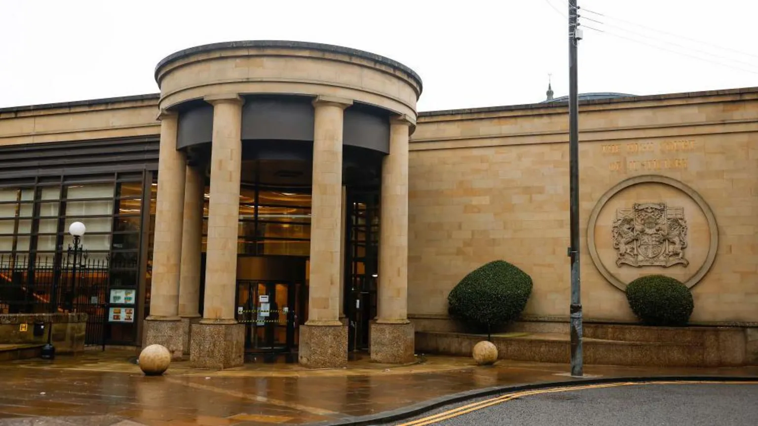 the pillared entrance to the High Court in Glasgow