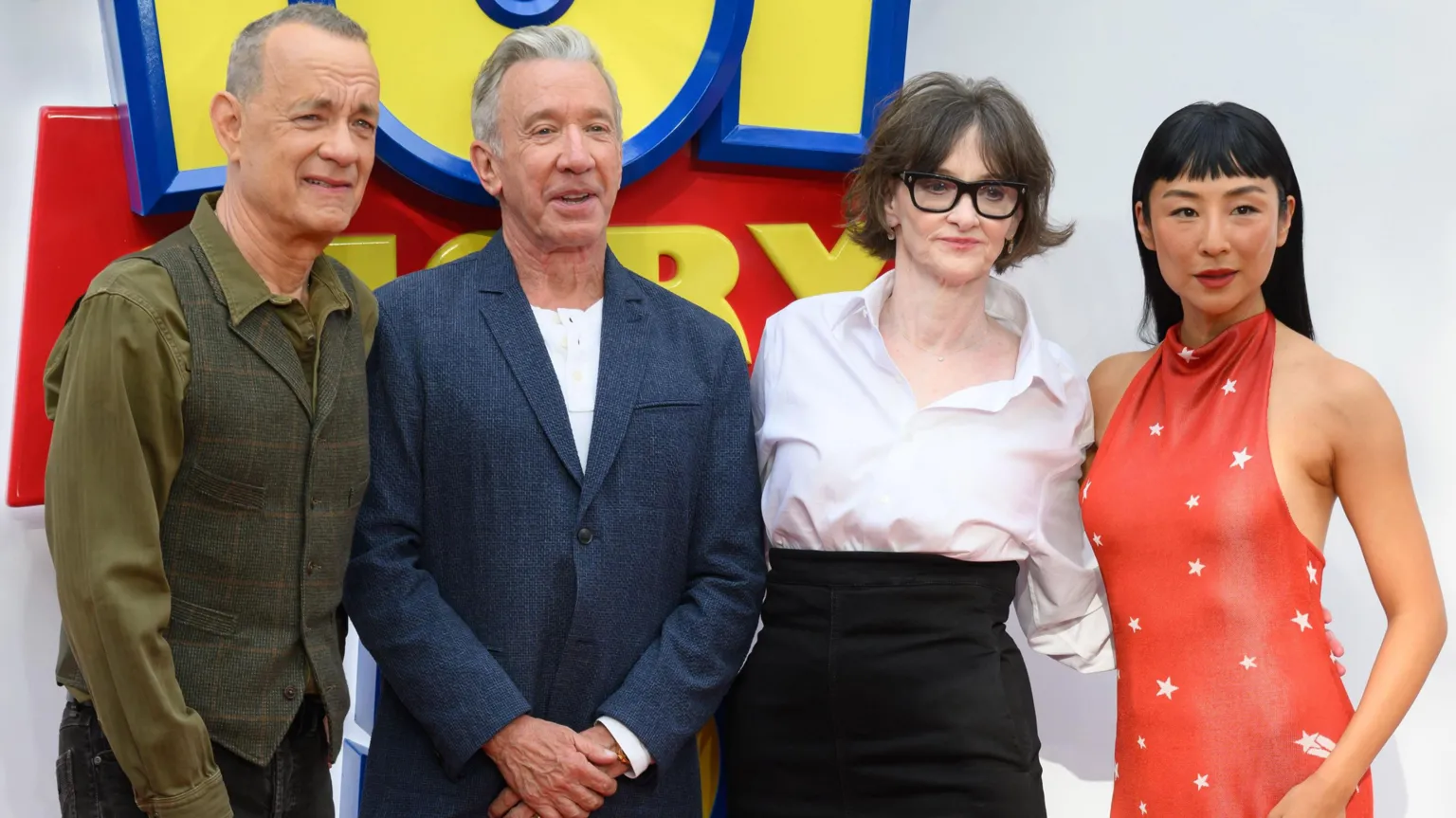 Tom Hanks, Tim Allen, Joan Cusack and Greta Lee pictured together at the premiere of Toy Story 5