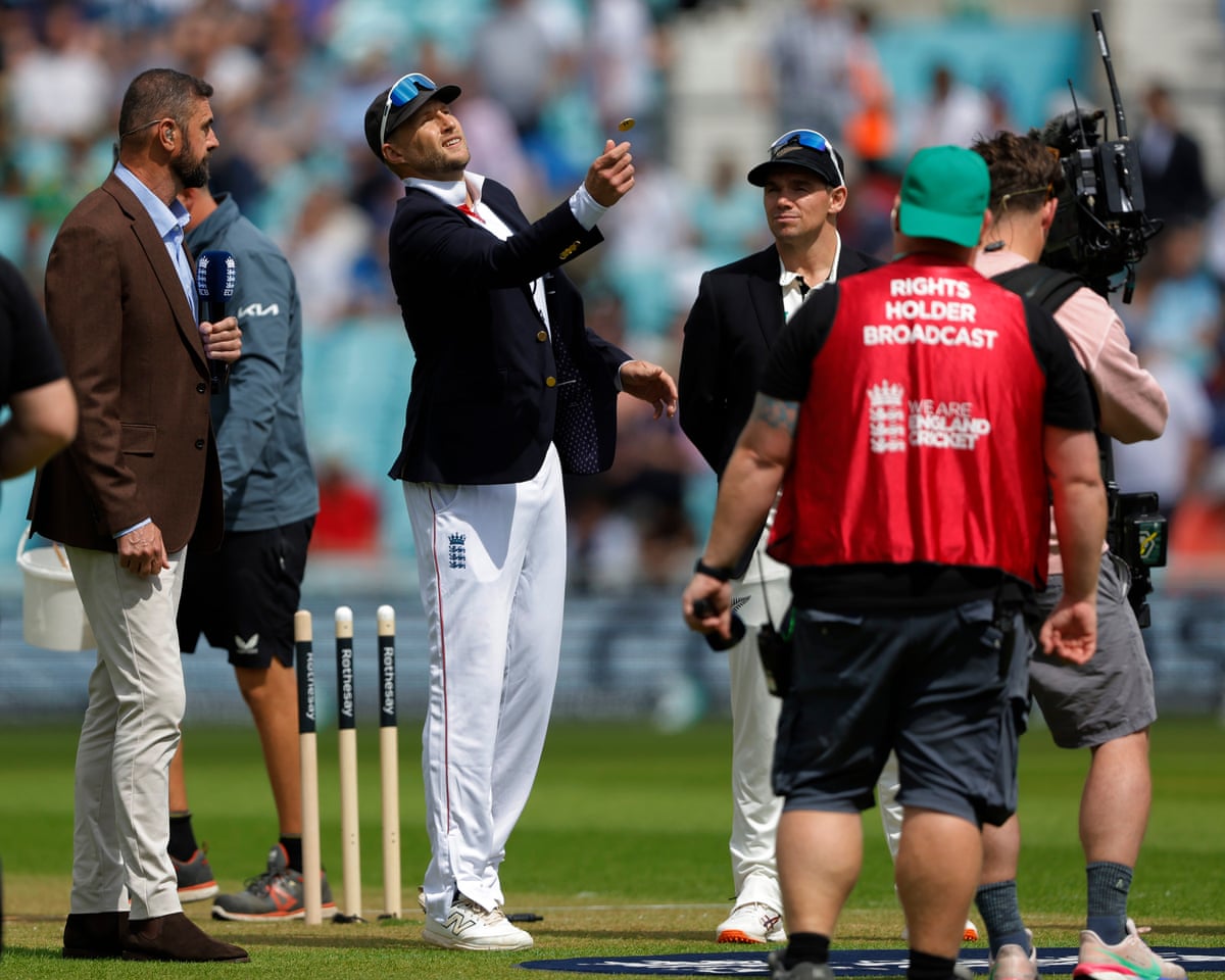 Joe Root flips the coin at the toss before start of play at the Oval