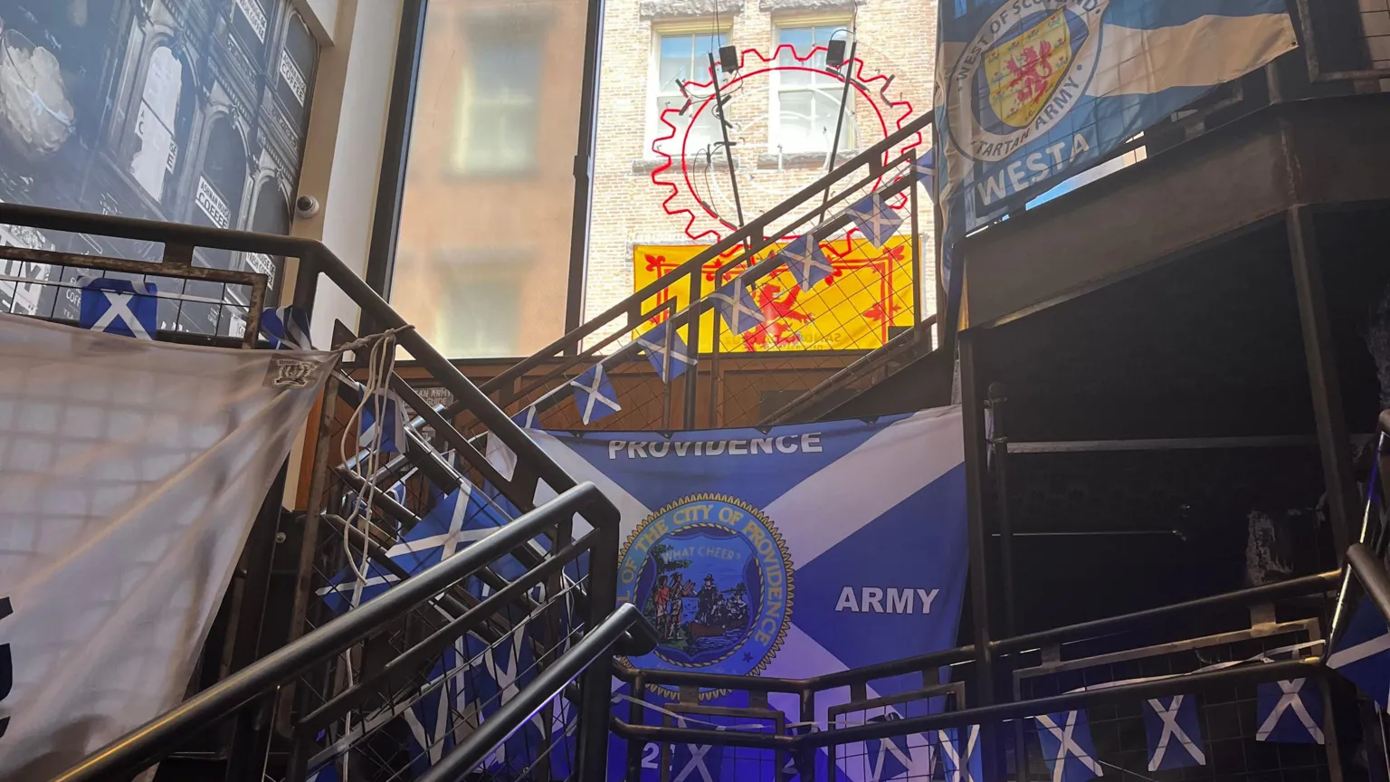 Saltire flags hung around a staircase