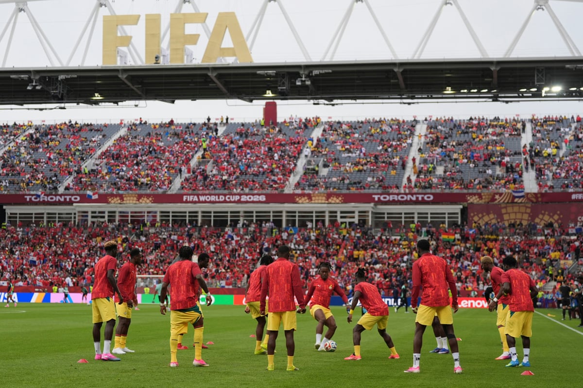 The Ghana players loosen up before their opening game