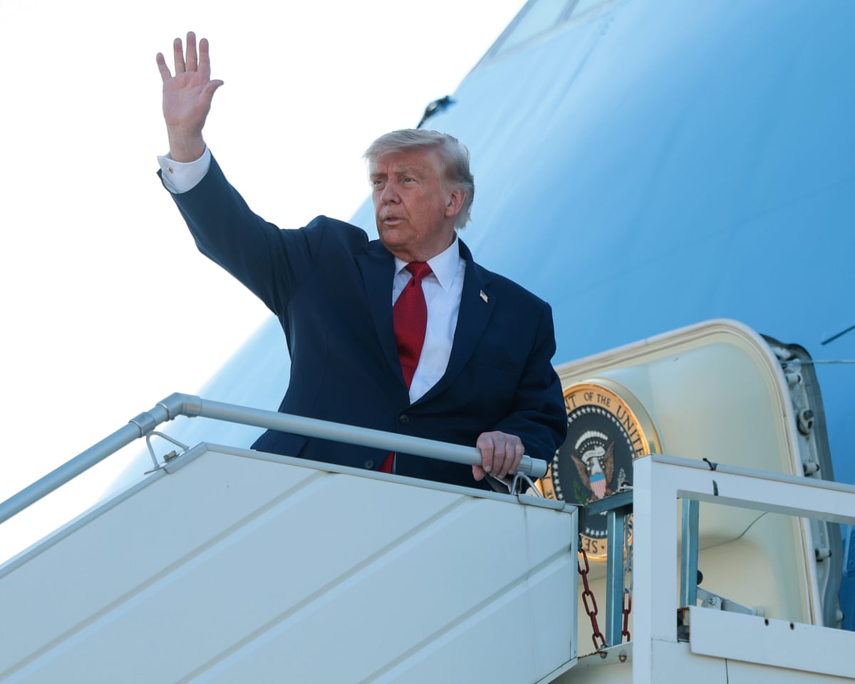 Donald Trump boards Air Force One as he departs Geneva airport after taking part in the G7 summit in Switzerland