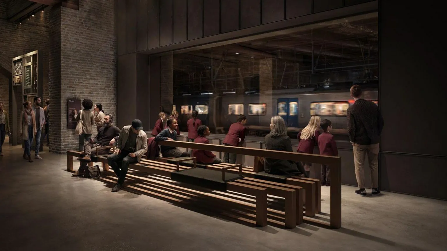 Secchi Smith People are sitting and standing on benches in a dimly lit indoor area of the general market, looking through a large window at a moving train on the platform outside